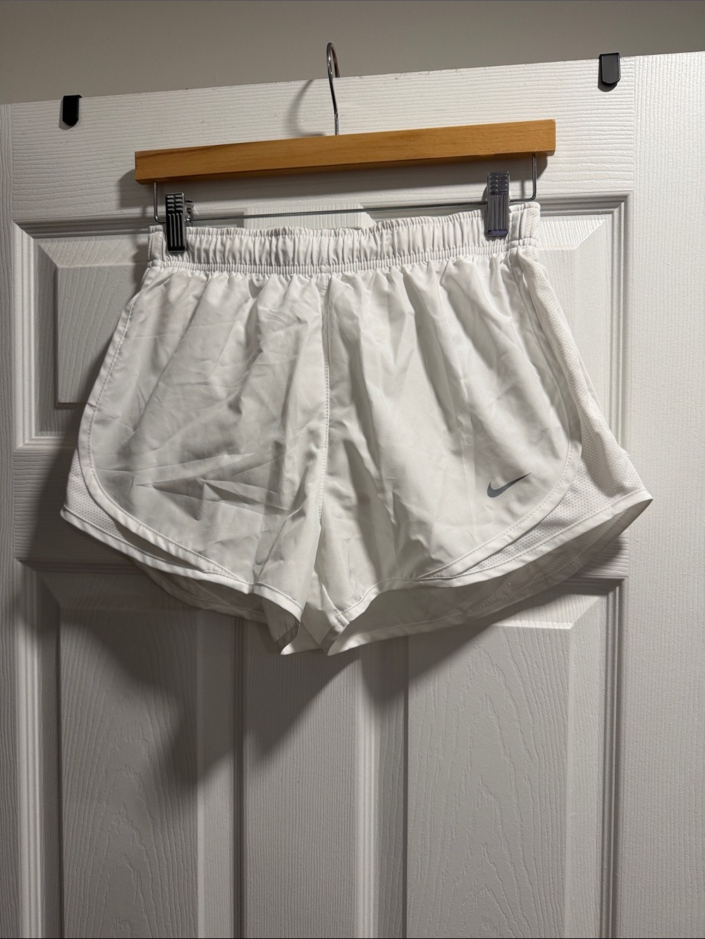 Nike Women's White Athletic Running Shorts with Subtle Swoosh